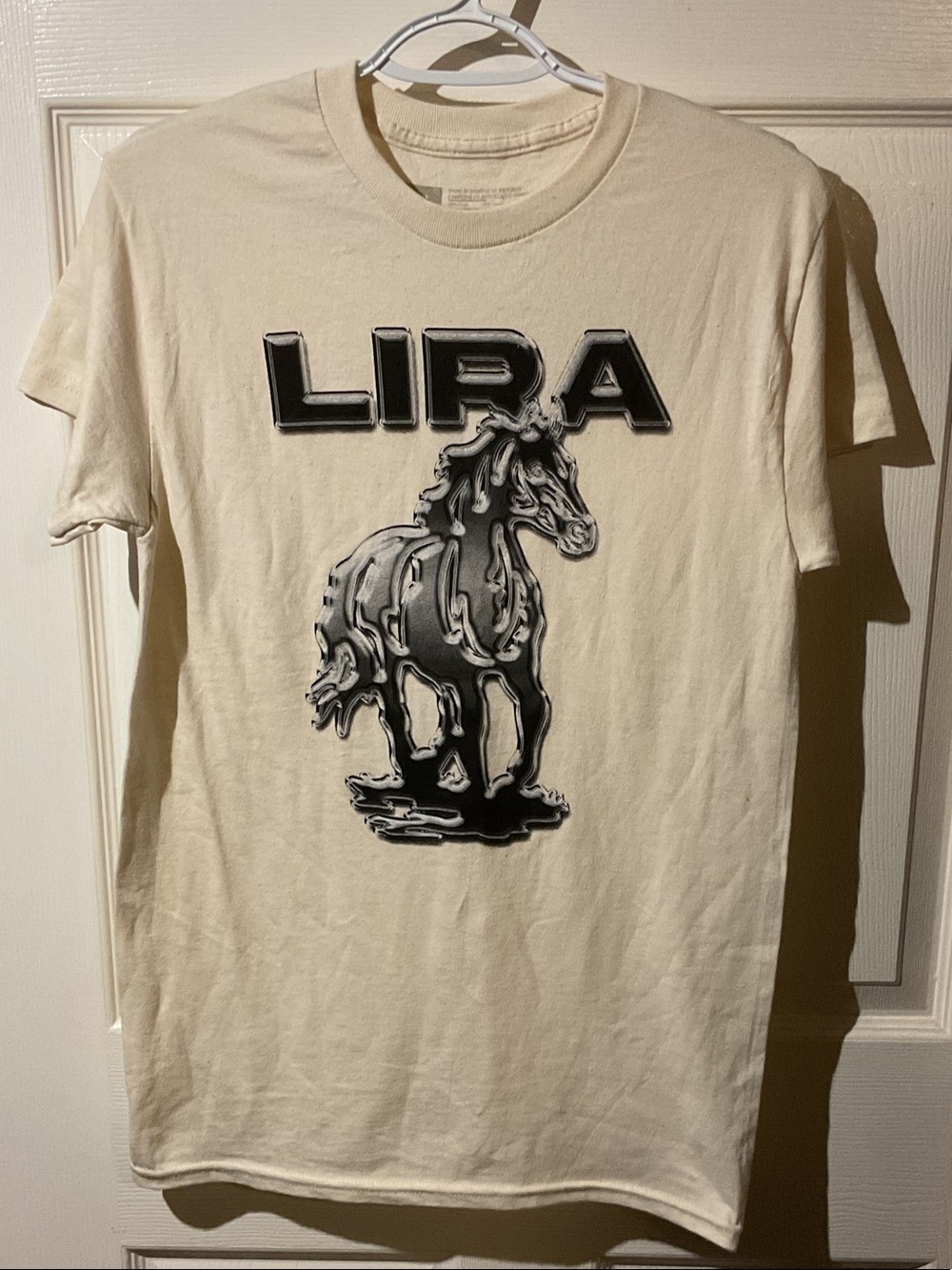 Lira Cream Tee with Black Horse Graphic